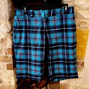 Nike Golf shorts , 12” inseam turquoise and black. Polyester and spandex